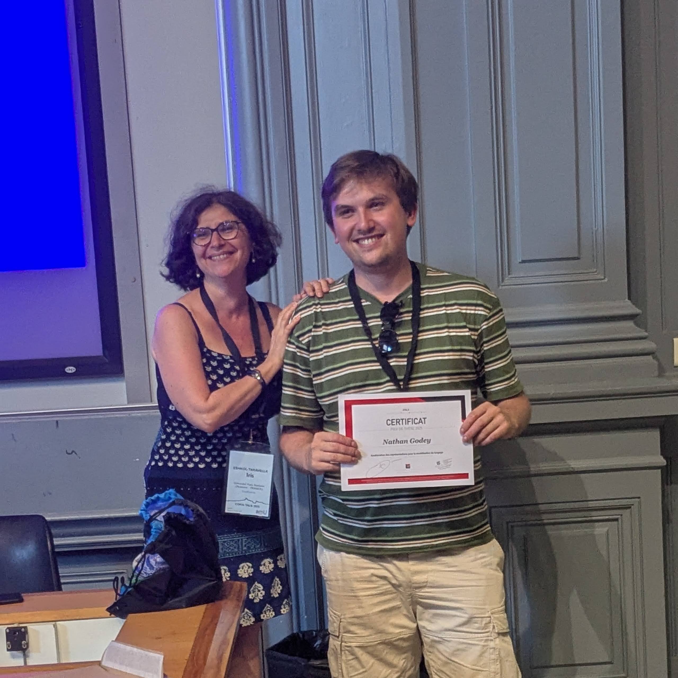 Receiving the ATALA prize certificate at TALN 2025